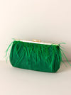 green clutch with ostrich feathers