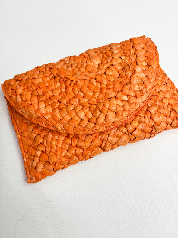 orange raffia clutch 