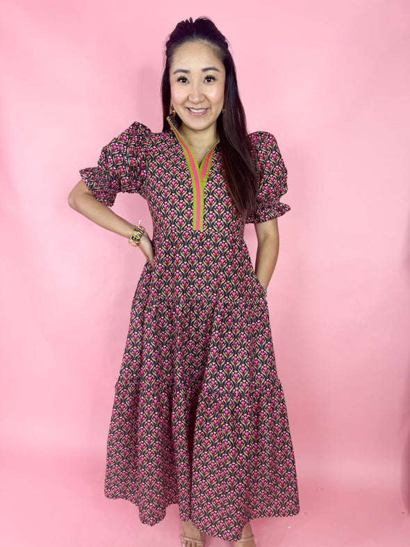 pink floral dress with contrasting pink and green v neckline 