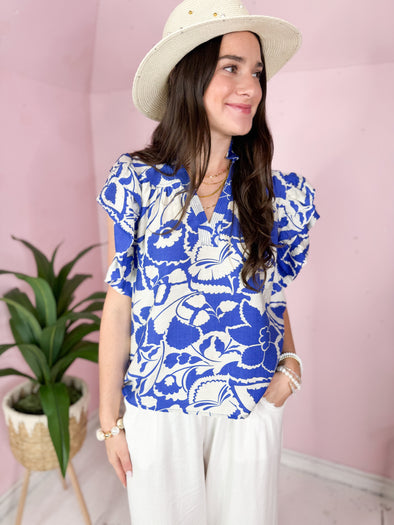 blue and white thml top 