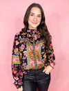 black floral top with ruffle collar
