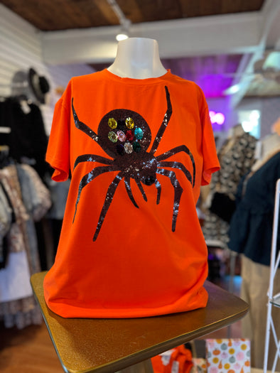 orange top with sequin spider
