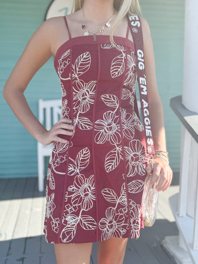 maroon dress with white floral embroidery 
