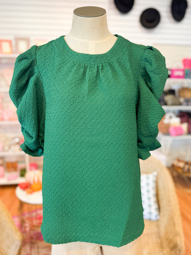 green top with rouched sleeves