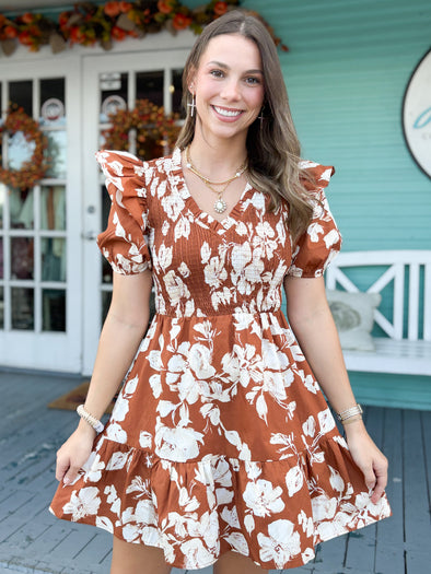 rust color mini dress with cream flowers 
