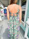 open back of green and purple floral print dress