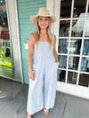 blue jumpsuit with embroidered palm trees
