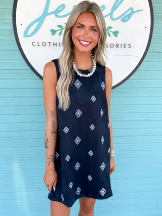 navy sleeveless dress with embroidery detail 