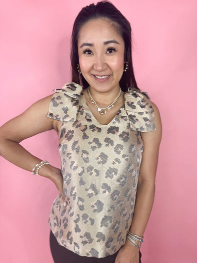 leopard sleeveless top with bows 