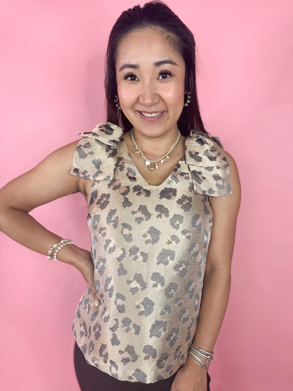 leopard sleeveless top with bows 