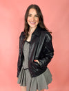 black leather jacket with gingham skirt and top 