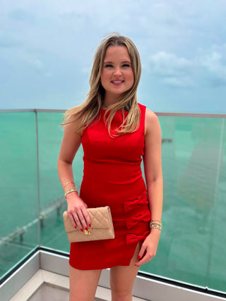 red mini dress with bows and front slit