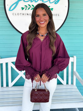 maroon top with lace edges 