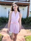 pink romper with front bow design 
