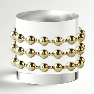 gold beaded bracelet stack 
